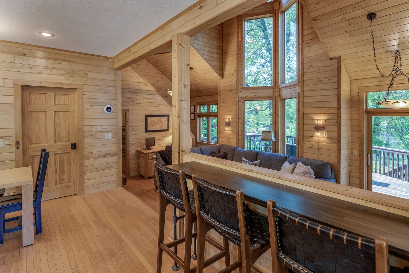 Open dining and bar with lake-view windows